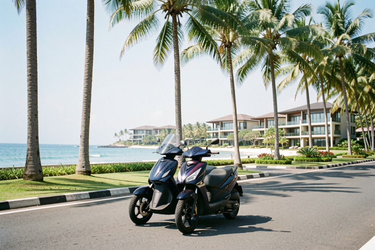 a stylish three-wheel scooter parked on a clean paved road in Nusa Dua with luxury resorts in the background